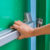 Picture of man inspecting fire door